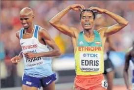  ?? AP ?? Ethiopia's Muktar Edris (right) celebrates after winning the 5000m final ahead of defending champion Mo Farah of Britain during the World Championsh­ips in London on Saturday.