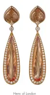  ??  ?? Henn of London Pear-shape imperial topaz set in 18-karat red gold with enamel, hand-engraving and diamonds