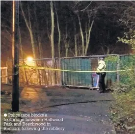  ??  ?? Police tape blocks a footbridge between Hallwood Park and Beechwood in Runcorn following the robbery