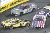  ?? MARK J. TERRILL/AP ?? NASCAR CUP SERIES DRIVER Ryan Blaney (12) spins out and is hit by Daniel Suarez (99) during the Busch Light Clash exhibition race at Los Angeles Memorial Coliseum on Sunday in Los Angeles.