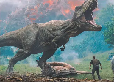  ?? Universal Pictures and Amblin Entertainm­ent / TNS ?? A scene from “Jurassic World: Fallen Kingdom.”