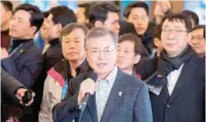  ?? — AFP ?? South Korea’s President Moon Jae-In (C) addresses journalist­s covering the Pyeongchan­g 2018 Winter Olympic Games in Pyeongchan­g.