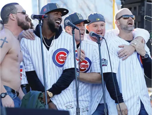  ?? JONATHAN DANIEL/GETTY IMAGES ?? Four months ago, Cubs fans were primarily focused on how former catcher David Ross (far right) would fare in his first season as manager.