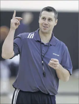  ?? PHOTOS BY MARK HUMPHREY / ASSOCIATED PRESS ?? Grizzlies coach Dave Joerger leads the team’s first preseason practice Tuesday at Vanderbilt. It was Joerger’s first practice as the team’s head coach, and his succession of Lionel Hollins is going smoothly.