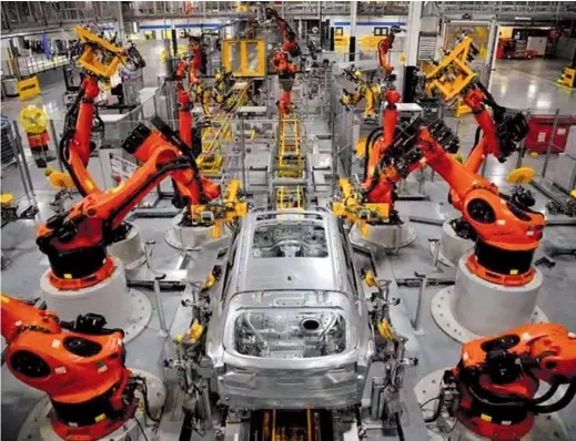  ??  ?? Autonomous robots assemble an X model SUV at the BMW manufactur­ing facility in Greer, South Carolina, US. — Reuters