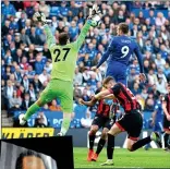  ??  ?? ICING ON THE CAKE: Vardy’s header makes it 2-0 and, left, Leicester fans salute Vichai Srivaddhan­aprabha