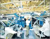  ?? RAMESH PATHANIA/MINT ?? The Suzuki Motor unit has asked employees to maintain a distance of 2 metres in areas like factory gates, canteens.