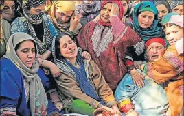  ??  ?? Relatives mourn during the funeral of Suhail Ahmad Wagay, a civilian killed in Shopian encounter, on
■
Monday. WASEEM ANDRABI/HT