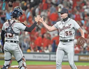  ?? JEFF CURRY/USA TODAY SPORTS ?? Tigers relief pitcher Alex Lange celebrates with catcher Eric Haase after the Tigers defeated the Cardinals, 5-4, on Friday at Busch Stadium in St. Louis.