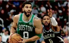  ?? STACY REVERE/GETTY IMAGES ?? Jayson Tatum did his best to fire up the Celtics, scoring 22 points and throwing down a pair of baseline dunks.
