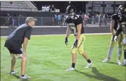  ??  ?? above: Drills were the order of the night for the Rockmart Yellow Jackets as they returned to the field. Below: Senior Reed Couch lines up to run a pattern for a long pass.