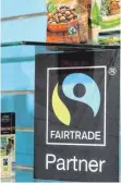  ?? FOTO: DPA ?? Das Fairtrade-Logo ist nun auch in Neu-Ulm überall zu sehen.