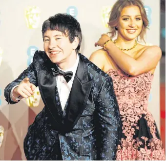  ?? PHOTOS: REUTERS ?? Starry night: Olivia Coleman (far left) – star of ‘The Favourite’ – arrives at the Albert Hall, London last night; Barry Keoghan (left) with his girlfriend Shona Guerin and (right) Laura Whitmore on the red carpet.