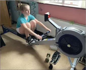  ??  ?? Sligo Rowing Club’s Ella Clarke practising on the rowing machine.