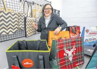  ?? JOHN MAHONEY • MONTREAL GAZETTE ?? Sylvia Feldzamen with antimicrob­ial shopping bags in the showroom of her business in Dollard-des-ormeaux.