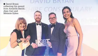  ??  ?? David Bryan collecting his award from Amanda Barrie, Alan Carr and Melanie Sykes