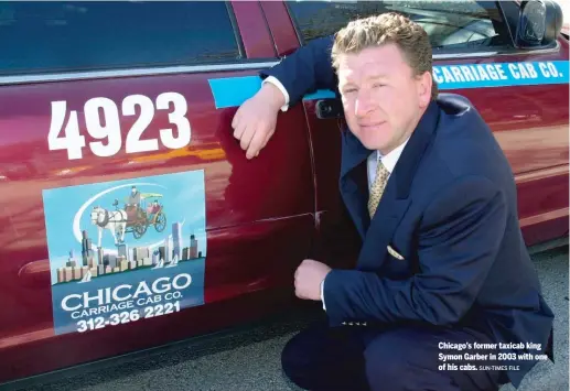  ?? SUN-TIMES FILE ?? Chicago’s former taxicab king Symon Garber in 2003 with one of his cabs.