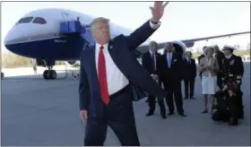  ?? SUSAN WALSH — THE ASSOCIATED PRESS FILE ?? President Donald Trump waves in front of the Boeing 787 Dreamliner while visiting the Boeing South Carolina facility in North Charleston, S.C.