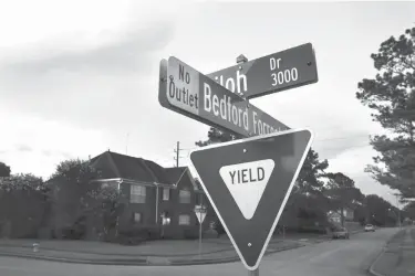  ?? Houston Chronicle via AP ?? n Bedford Forrest Drive is shown inside the Shiloh neighborho­od on July 9 in Missouri City, Texas. The street is named after Nathan Bedford Forrest, a lieutenant general in the Confederat­e Army during the American Civil War.