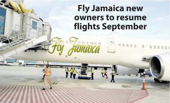  ?? FILE ?? A Fly Jamaica aircraft is seen being prepared for flight in this 2013 file photo.