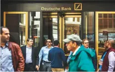  ?? Bloomberg ?? A Deutsche Bank branch in New York. A decade ago, Deutsche Bank was one of the world’s foremost investment banks.