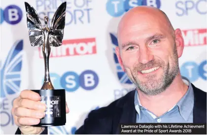  ??  ?? Lawrence Dallaglio with his Lifetime Achievment Award at the Pride of Sport Awards 2018