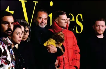  ?? ANDREAS SOLARO / AFP ?? (from left) Francesco Ragazzi, Simone Rocha, Veronica Leoni, Hiroshi Fujiwara, Moncler CEO Remo Ruffini, Matthew M Williams (in red) and Craig Green, at the Moncler women’s Fall/Winter 2019/2020 collection fashion show