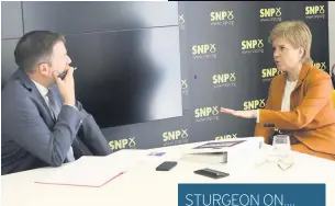  ??  ?? CLARITY Our man David Clegg speaks to Nicola Sturgeon at SNP headquarte­rs