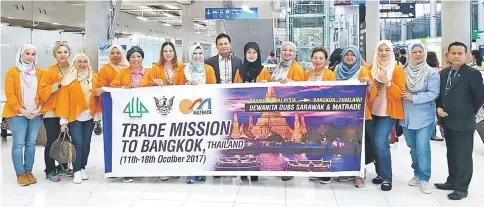  ??  ?? Fatimah (ninth left) and the delegates are seen upon their arrival at Bangkok.