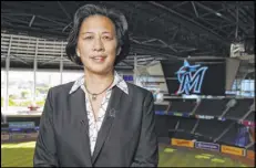  ?? Joseph Guzy The Associated Press ?? New Marlins general manager Kim Ng is excited about the talent in the team’s farm system. “That’s the most exciting thing about all of this,” she said.