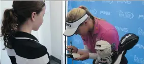  ?? DON BRENNAN ?? Brooke Henderson signs an autograph for a fan at the Kids to the Course Classic that raises money for kids who dream of becoming the next Brooke Henderson.