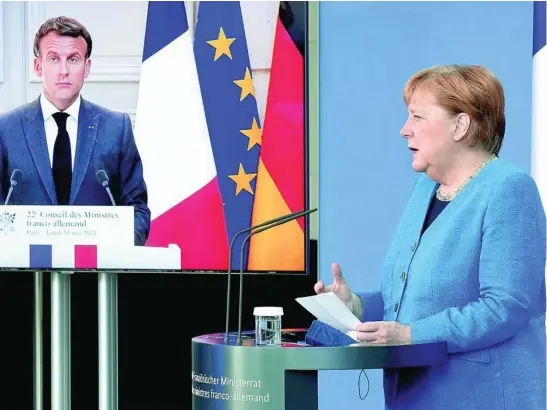  ?? REUTERS ?? Angela Merkel y Emmanuel Macron, ayer, en una rueda de prensa telemática