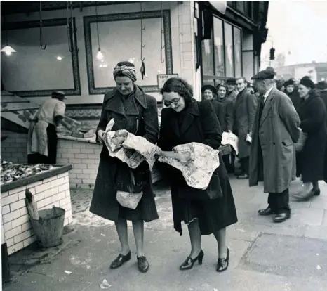  ??  ?? Cod war: British housewives compare fish during World War II. Fish wasn’t rationed