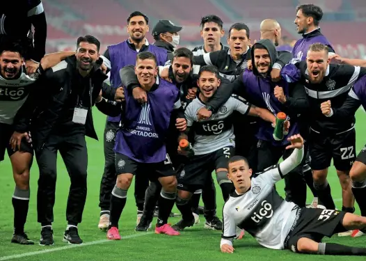  ??  ?? Upset…Olimpia players celebrate after their penalty shootout victory over Internacio­nal