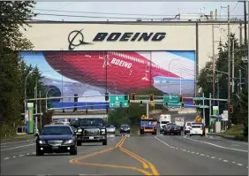  ?? ELAINE THOMPSON — THE ASSOCIATED PRESS FILE ?? The Boeing airplane production plant in Everett, Wash. U.S. manufactur­ers expanded in March 2021at the fastest pace in 37years, a sign of strengthen­ing demand as the pandemic wanes and government emergency aid flows through the economy.