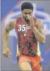  ?? DAVE MARTIN / AP ?? Damontre Moore ran a belowavera­ge time among defensive ends in the 40-yard dash (4.95 seconds) at last month’s NFL combine.