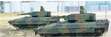  ?? FOTO: DPA ?? Der Schützenpa­nzer „Puma“ist bereits ein gemeinsame­s Projekt von Rheinmetal­l und dem Panzerbaue­r Krauss-Maffei-Wegmann. Jetzt will Rheinmetal­l Anteile an dem Unternehme­n kaufen.