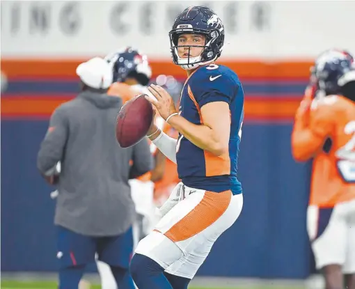  ?? Joe Amon, The Denver Post ?? Kevin Hogan, above, will start for the Broncos at quarterbac­k Thursday night against the Atlanta Falcons in Canton, Ohio.