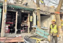  ?? Jessica Meyers For The Times ?? HIPPO BAR, located in one of Beijing’s ancient alleyways, gets a drastic makeover ordered and paid for by the city. “My heart hurts,” its owner said.