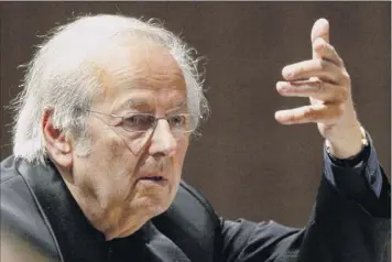  ?? Urs Flueeler Keystone via AP ?? Andre Previn, conducting the Oslo Philharmon­ic Orchestra at the 2004 Lucerne Festival in Switzerlan­d, also wrote musicals, orchestral and chamber works, operas and concertos.
