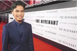  ?? COURTESY OF ERIC CHARBONNEA­U/TWENTIETH CENTURY FOX ?? Bosque School senior Forrest Goodluck at the premiere of “The Revenant” in Hollywood, Calif.