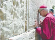  ?? (Marc Israel Sellem/The Jerusalem Post) ?? ARCHBISHOP OF CANTERBURY Justin Welby prays at the Western Wall yesterday.