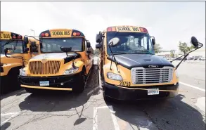  ?? Arnold Gold / Hearst Connecticu­t Media ?? Durham School Services buses parked outside of the former Sears Auto Center at the Connecticu­t Post Mall in Milford on August 14, 2020.