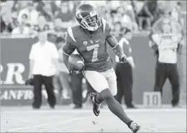  ?? Shotgun Spratling ?? USC RECEIVER Steven Mitchell Jr., shown returning a kickoff Oct. 1 against Arizona State, caught 24 passes this season for a total of 226 yards.