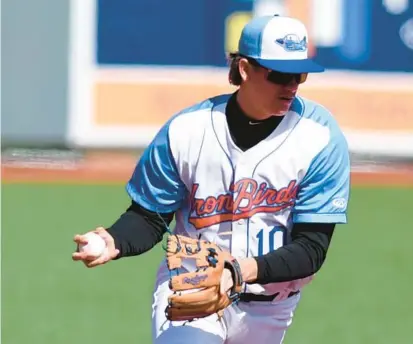  ?? MATT BUTTON/BALTIMORE SUN MEDIA ?? Aberdeen infielder Coby Mayo fields a ground ball during a game against Wilmington on April 17. Mayo is the Orioles’ No. 5 prospect, entering Wednesday as one of only three minor leaguers 20 years old or younger with double-digit home runs.