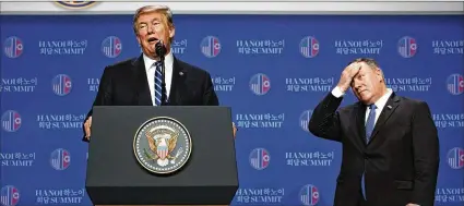  ?? EVAN VUCCI / ASSOCIATED PRESS ?? President Donald Trump speaks as Secretary of State Mike Pompeo looks on during a news conference after the summit with North Korean leader Kim Jong Un ended Thursday in Hanoi.