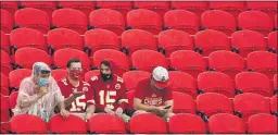  ??  ?? Fans watch the Chiefs during training camp on Saturday at Arrowhead Stadium in Kansas City, Mo. The Chiefs plan to open the regular season with a reduced capacity of approximat­ely 22 percent of normal attendance.
CHARLIE RIEDEL — THE ASSOCIATED PRESS