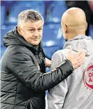  ??  ?? Ole Gunnar Solskjaer (left) and City boss Pep Guardiola at the end of the match; below, Anthony Martial, holding off Ruben Dias, showed tantalisin­g glimpses of the player he could be