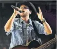  ?? IAN KUCERAK/ POSTMEDIA NEWS ?? Country singer Brett Kissel at Edmonton’s Rogers Place in October — he’s playing the River Cree parking lot June 13.