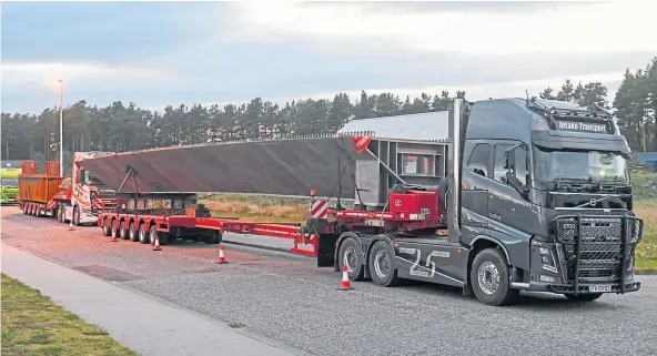  ?? ?? TAKE THE HIGH LOAD: One of the metal beams being transporte­d to the site of the replacemen­t Gairnshiel Bridge. Picture by Kenny Elrick.